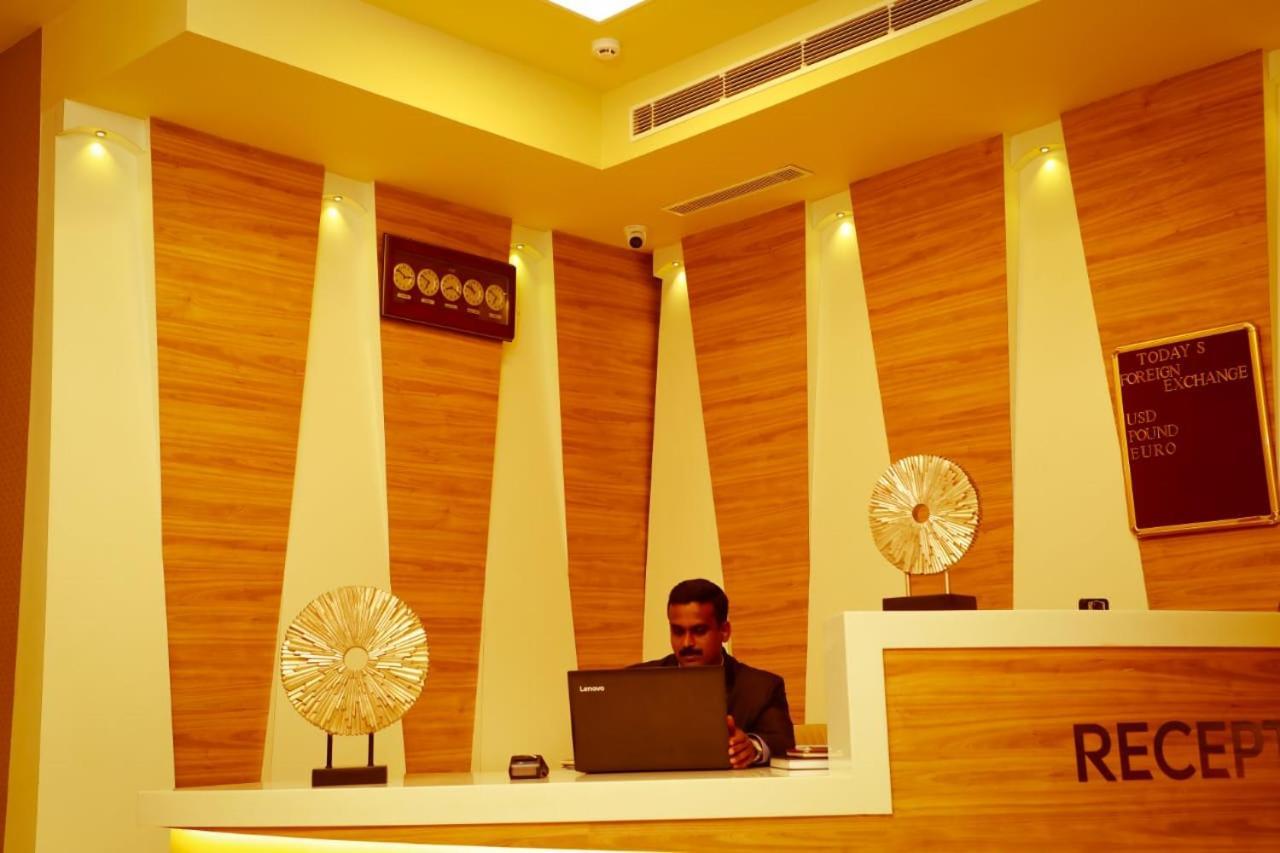 Hotel New York Square Kottayam Extérieur photo